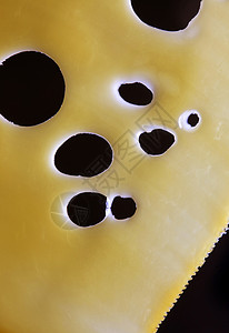 奶酪宏观牛奶香气黄色椭圆形奶制品食物气泡圆形图片