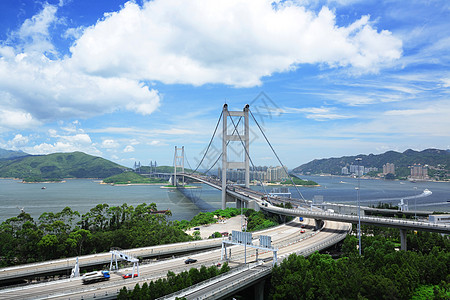 清马桥辉光车辆运动城市天空场景汽车街道运输市中心高清图片