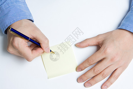 书面写作的人草稿思考商务草图训练文档蓝色笔记手指学习图片