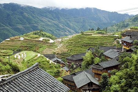 吉林附近的中国村竹子农民丘陵房子山脉木头小屋森林绿色农业背景