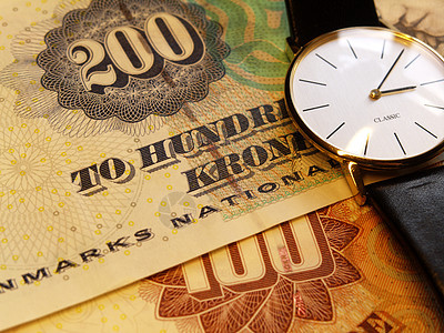 时间和金钱手表货币背景图片
