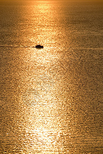 黄金日落的船海洋航海图片