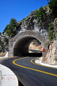 山山隧道旅行黄色隧道沥青岩石路线探索建造交通曲线图片