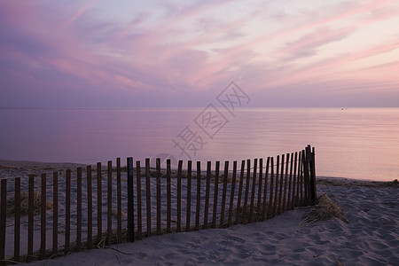 密歇根湖日落粉色栅栏海滩图片