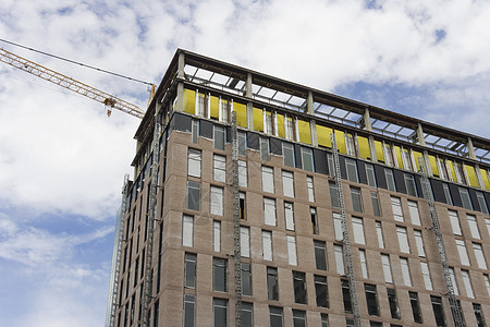 建筑施工楼下住宅城市起重机蓝色工程财产天空砖块构造办公室背景图片