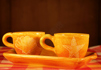 黄杯黄色桌子休息菜单咖啡餐厅早餐杯子红色厨房背景图片