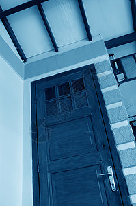 A Wooden 门门户网站入口房子住宅木头建筑学街道建筑安全出口背景图片