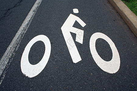 自行车路牌街道车道白色路面黑色图片