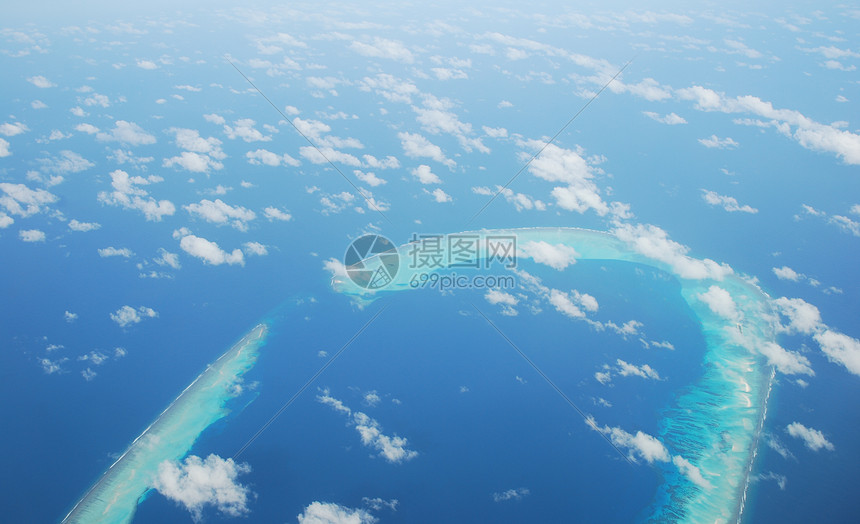 飞机对马尔代夫岛的观察车辆空气地平线旅行航程假期航空航天海洋天空图片