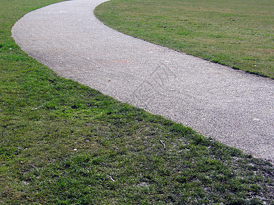 曲线曲线路径绿色石头灰色草地石屑途径小路图片
