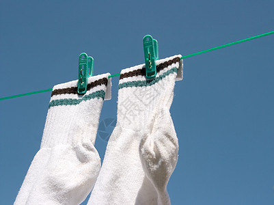 袜子蓝色花园纺织品晴天烘干机织物衣绳洗涤洗衣店家务图片