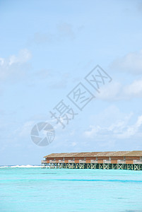 马尔代夫的水别墅海岸乐趣支撑平房旅行海岸线酒店异国建筑学海洋图片