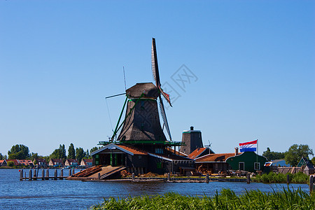 荷兰的磨坊照片乡村供电地标铣削蓝色历史溪流文化力量图片