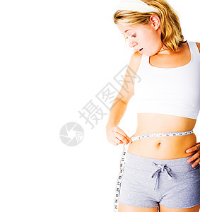 衡量自己白白度日的年轻妇女女孩身体重量损失微笑女性力量肚子女士腹肌图片