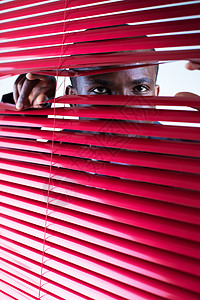 红百叶窗眼睛男人百叶窗安全焦点扫视好奇心办公室隐藏商业背景图片