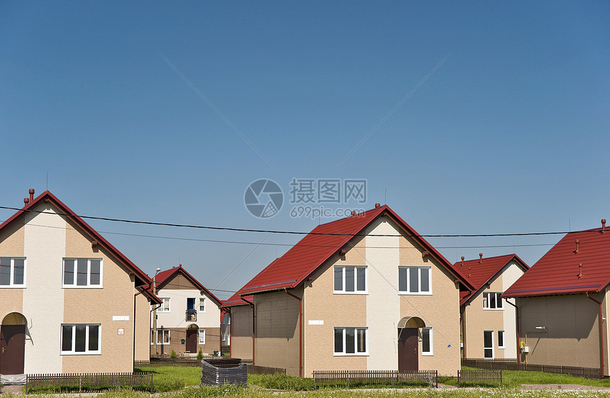 棚屋住宅红色建筑学建筑物不动产房地产露天前提蓝色阳光图片