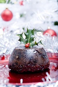 圣诞节布丁甜点装饰品杏子干果香料派对水果庆典糖浆葡萄干背景图片
