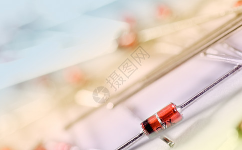 DIP 风格的二极管电子晶体管芯片蓝色管子半导体红色橙子电路紫色金属图片
