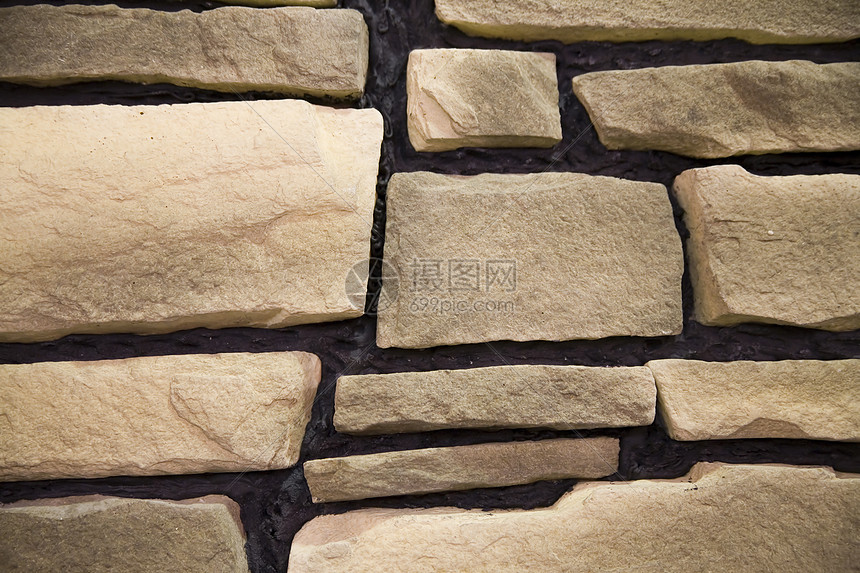沙石墙碎片岩石建筑师石墙石方橙子砖墙工作建筑瓦砾砂岩图片