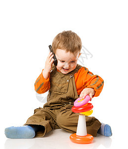 男孩玩游戏电话喜悦乐趣快乐细胞婴儿儿子童年好奇心金发图片