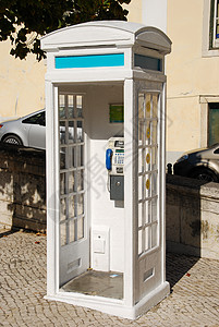 里斯本的白葡萄牙语电话亭历史性摊位嗓音古董路面复古风格盒子白色民众图片