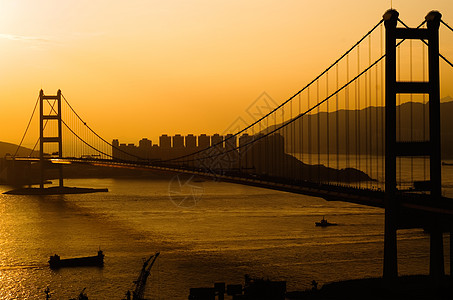 香港清马桥日落戏剧性运输天际地标港口橙子太阳景观辉光建筑图片