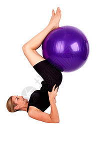 瑜伽健身房女性女士紫色练习训练风度火车锻炼黑色背景图片