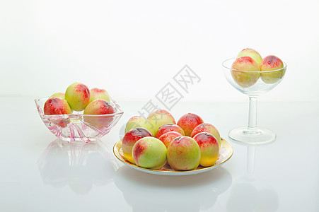 桃树绿色玻璃造型骨瓷瓷器盘子酒类粉色图片
