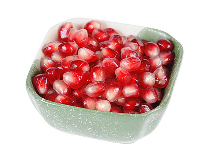 石榴谷物盘子水果宏观粒子颗粒状种子甜点食物红色植物图片