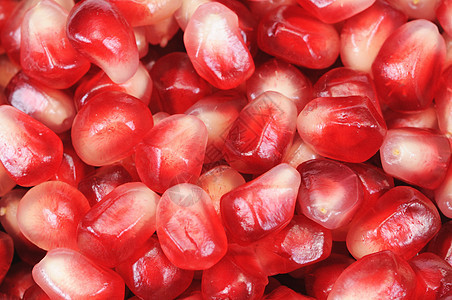 石榴谷物水果甜点种子盘子食物颗粒状宏观红色植物图片