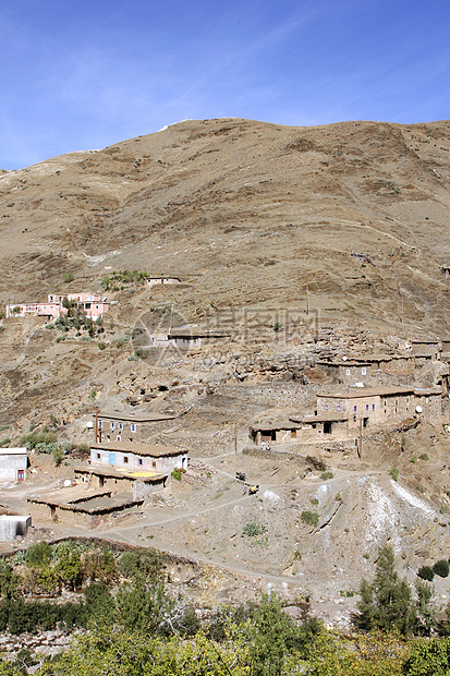 摩洛哥阿特拉斯山的一个村庄的景象摄影环境小屋岩石地质学天空地方房屋山脉目的地图片
