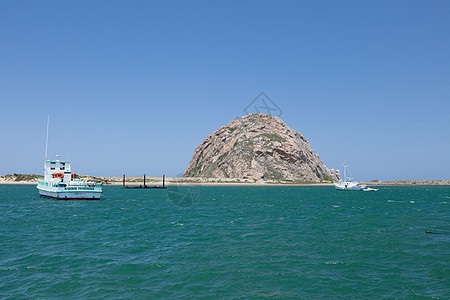 莫尔罗湾钓鱼航行海岸线岩石海洋悬崖风景港口天空旅行图片