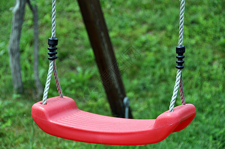 红色摇摆操场座位玩具青年绿色孤独塑料娱乐乐趣花园图片