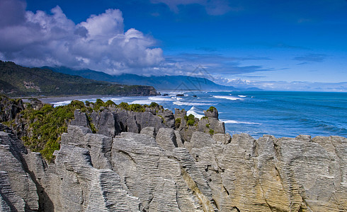 Punakaiki 煎饼摇滚地标石灰石地平线饼子冲浪项目旅游石头支撑地质学图片