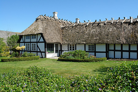 传统的丹麦传统古典丹麦国家吊起来的房屋天空住宅遗产入口财产石头建筑旅行稻草城市图片