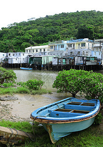 Tai O钓鱼村 香港有高楼小屋木头住宅旅行蓝色棚户区风化村庄窝棚场景天空图片