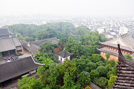 中国苏州市空中航向房子寺庙建筑物植物天线住宅宝塔烟雾花园吸引力图片