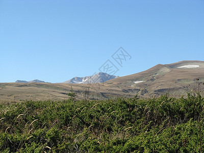 腊果纳基高原植物群天空高山旅行植被剪影山脉文件冰川一条路线图片