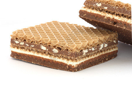 装满了巧克力的面包饼坚果白色长方形甜点矩形糕点晶圆棕色正方形可可图片