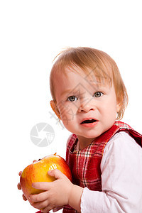 女孩吃苹果卷曲享受童年快乐女儿孩子微笑生长喜悦食物图片