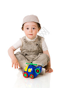 男孩玩游戏喜悦快乐玩具头发儿子反射童年婴儿孩子金发图片