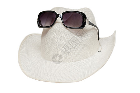 白色背景的帽子和太阳镜图片