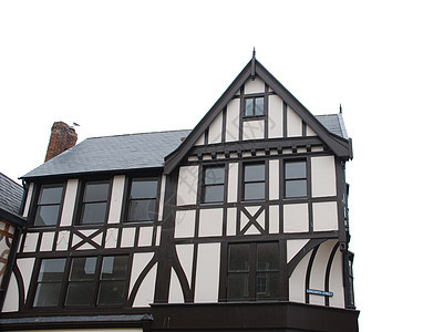 黑色和白色房屋隔离的木头古董窗户历史建筑木材小屋地区建筑学历史性图片
