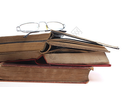 旧书上的眼镜大学传统家庭作业图书馆页数智慧教育文学白色学习图片