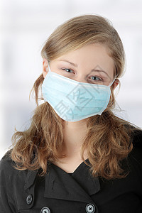 一个戴面罩的模型 防止黄油流感感染药品流感危险安全女性面具女士卫生保健疾病图片