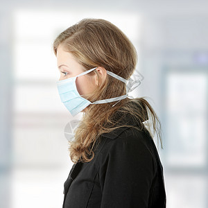 一个戴面罩的模型 防止黄油流感感染保健女孩卫生面具预防疾病危险工作室女性感染图片