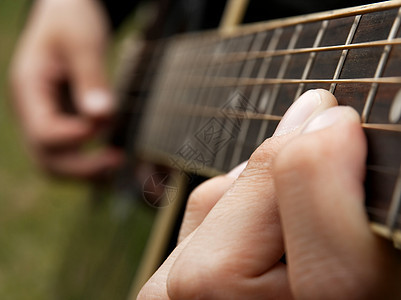 吉他员艺术吉他细绳音乐旋律手指脖子蓝调爵士乐宏观图片