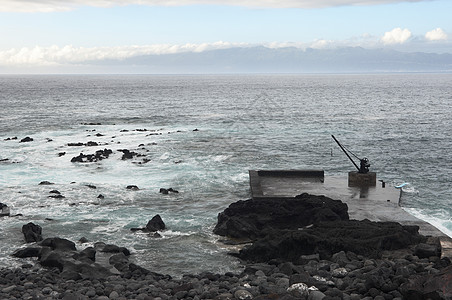 弃鱼天气海岸线火山天空波浪支撑蓝色海洋地平线海景图片