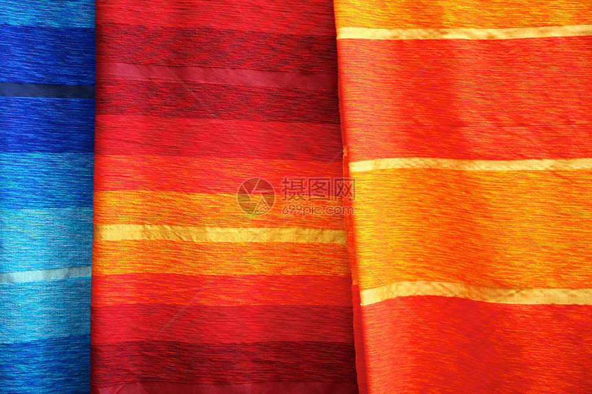 色彩多彩的制造丝绸小地毯市场织物文化零售画幅红色纺织品羊毛图片