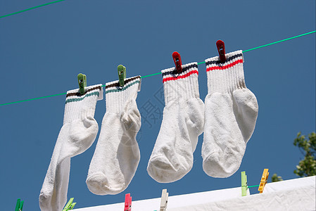 上衣线烘干卫生天空纺织品房子洗涤袜子衣架家务洗衣店图片
